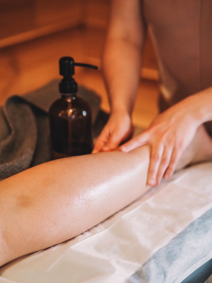 A calming massage therapy session with aromatic oils for relaxation and wellness.